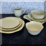 K22. 75 Piece Lenox French Perle china set in ”Pistachio” green. Set includes: 14 dinner plates, 12 dinner bowls, 10 square dinner plates, 12 - 6” cereal bowls, 10 dessert bowls, 10 lunch plates, 6 - 7.5” dessert/pie plates and 10 mugs - $395 